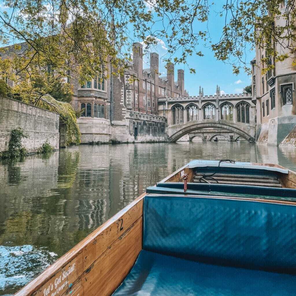 View from the bow of a punt towards the Bridge of Sighs at St John's College on the River Cam