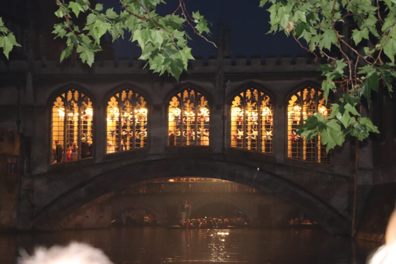 night time bridge of sighs in Cambridge for may ball firework punting display