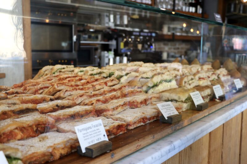 A display of focaccia sandwiches at Aromi Cambridge