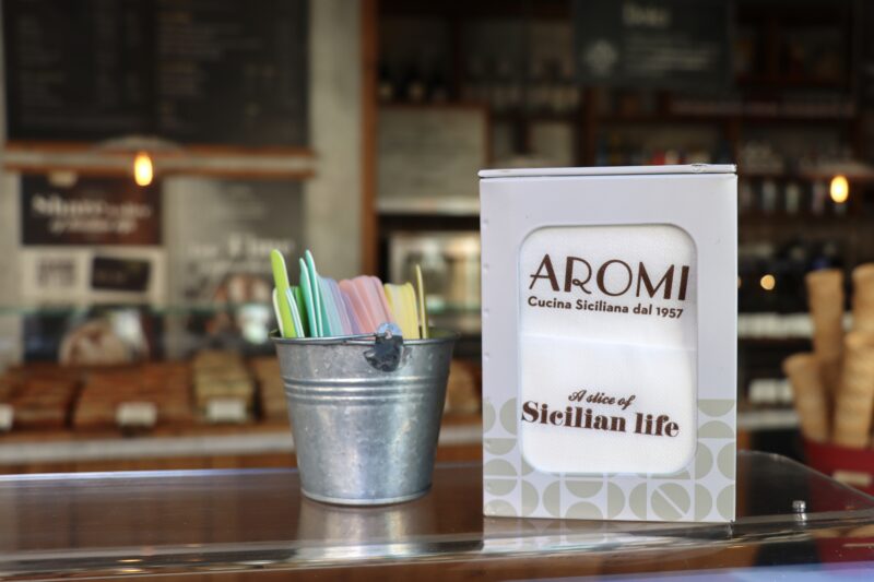 Ice cream spoons and tissue box at Aromi Cambirdge through their gelato window