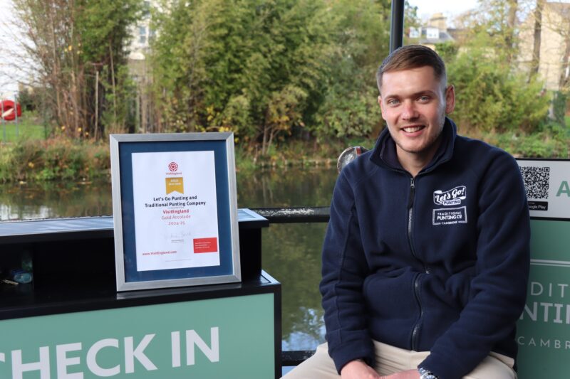 VisitEngland Gold Accolade award certificate at Let's Go Punting's check-in desk
