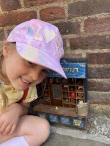 Young girl and a dinky door
