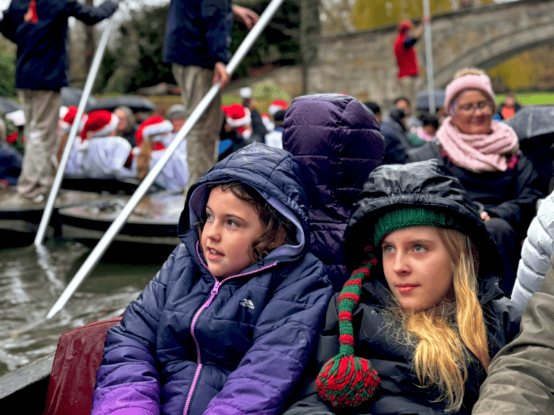 Two Girls Punting at Chrmas Carols on the River