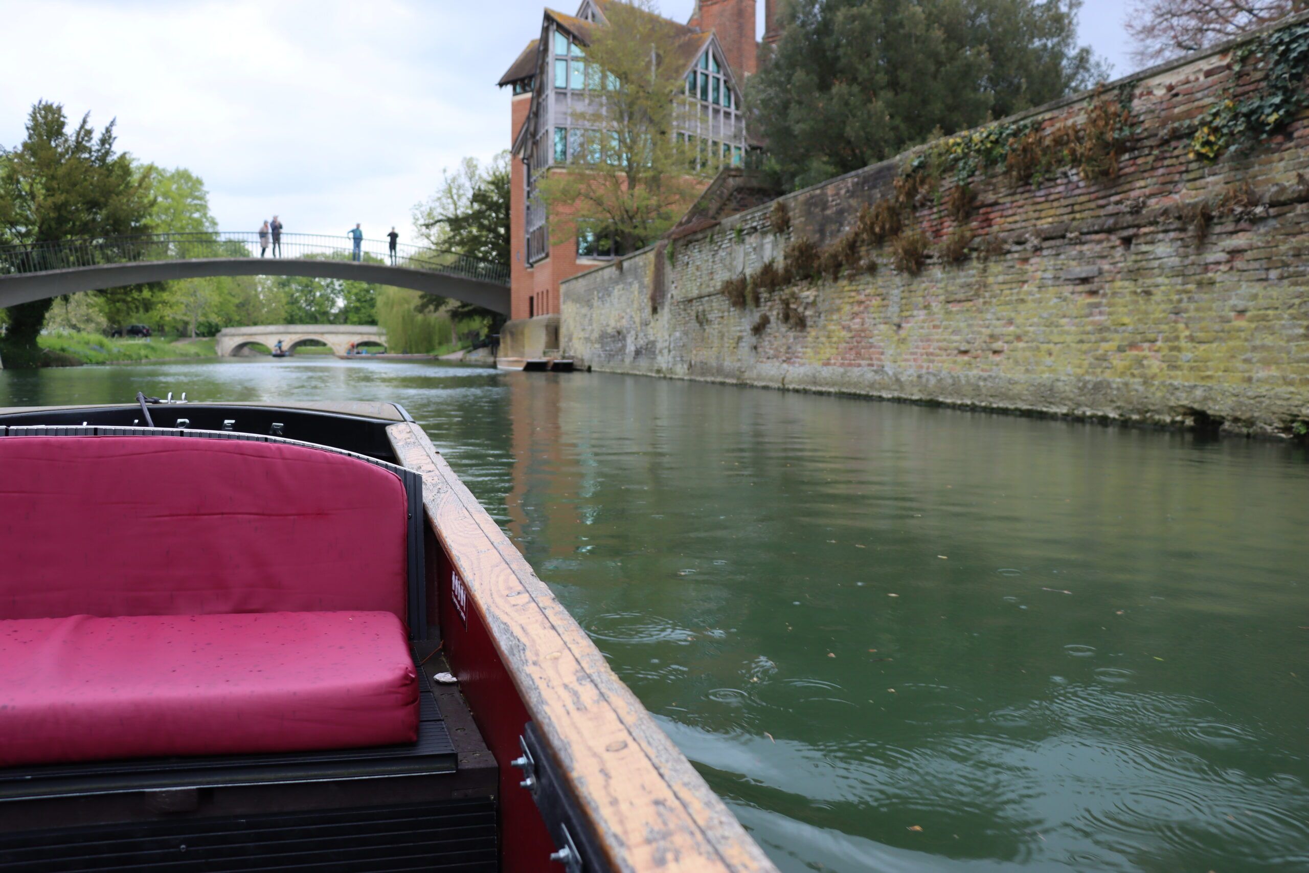 the pov of a passenger on a punting boat on The River Cam Cambridge England