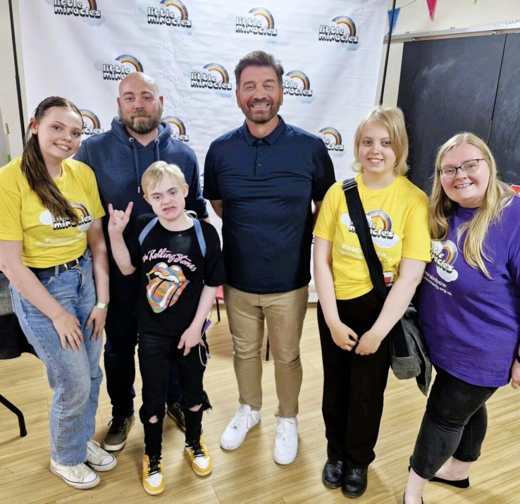 Nick nowels visiting a Little miracles charity support group and spending time with disabled children and their families