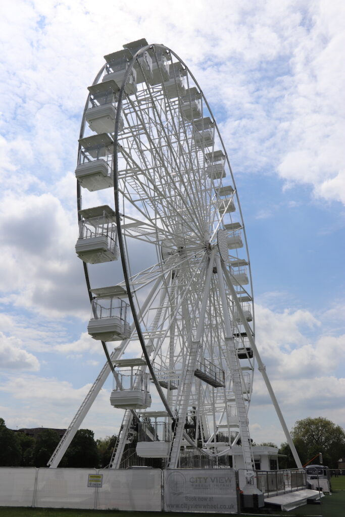 White observation wheel standing on Parker's Piece in Cambridge city centre.